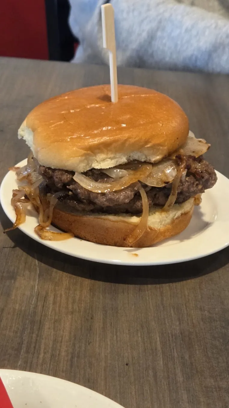 A burger with fried onions