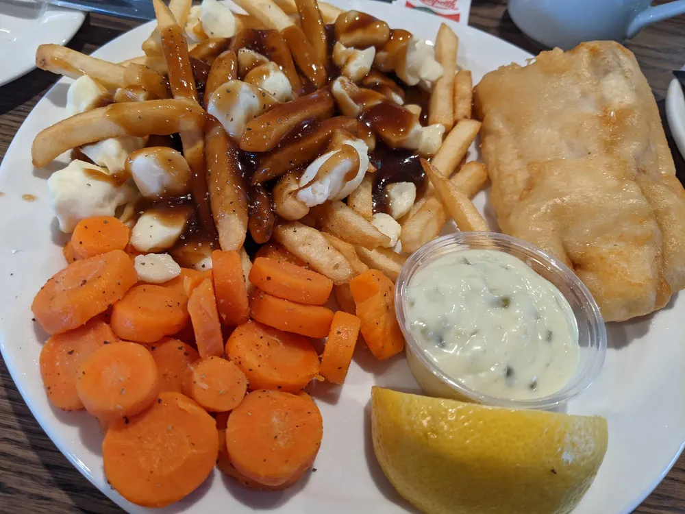 Fish and chips with poutine and carrots