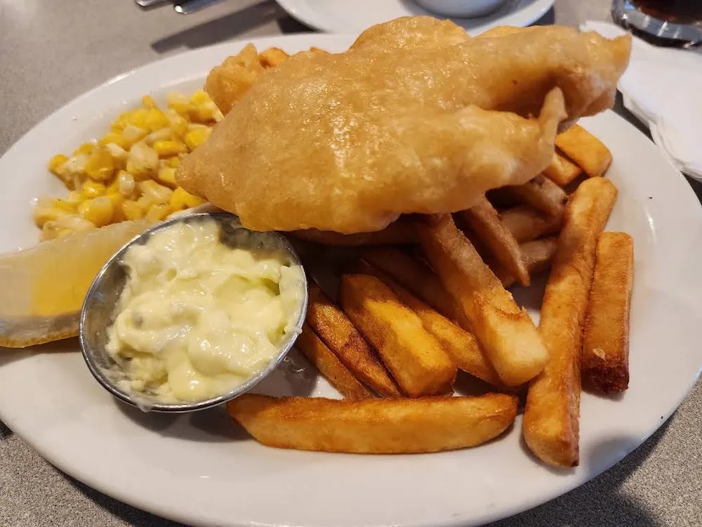 Fish and chips with corn and tartar sauce